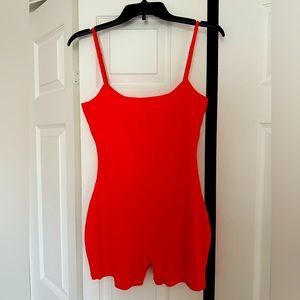 Skims Soft Lounge Onesie in “Fire”